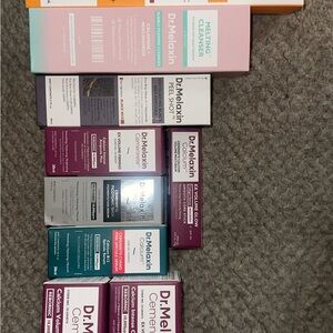 De.Melaxin Skincare Serum & Face Oil Set - Purple and White